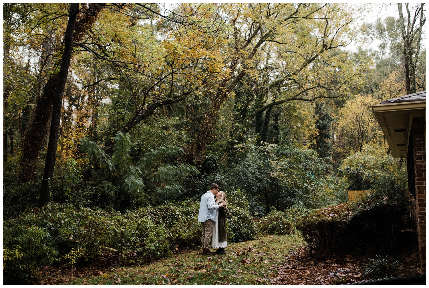Rainy Day Engagement Session in Marietta, Georgia with cute couple dancing in the rain